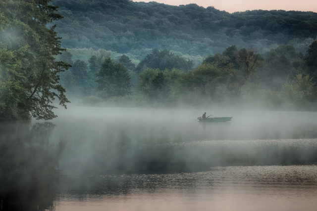 Boat in the morning fog
